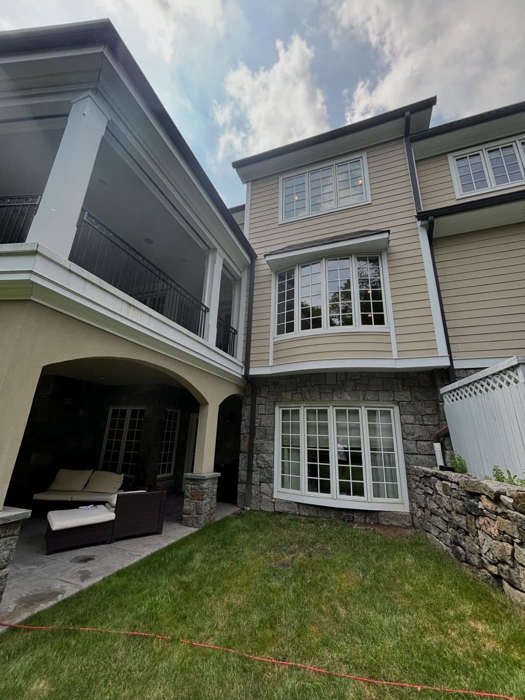 Hillside home with a long window wall, cleaned