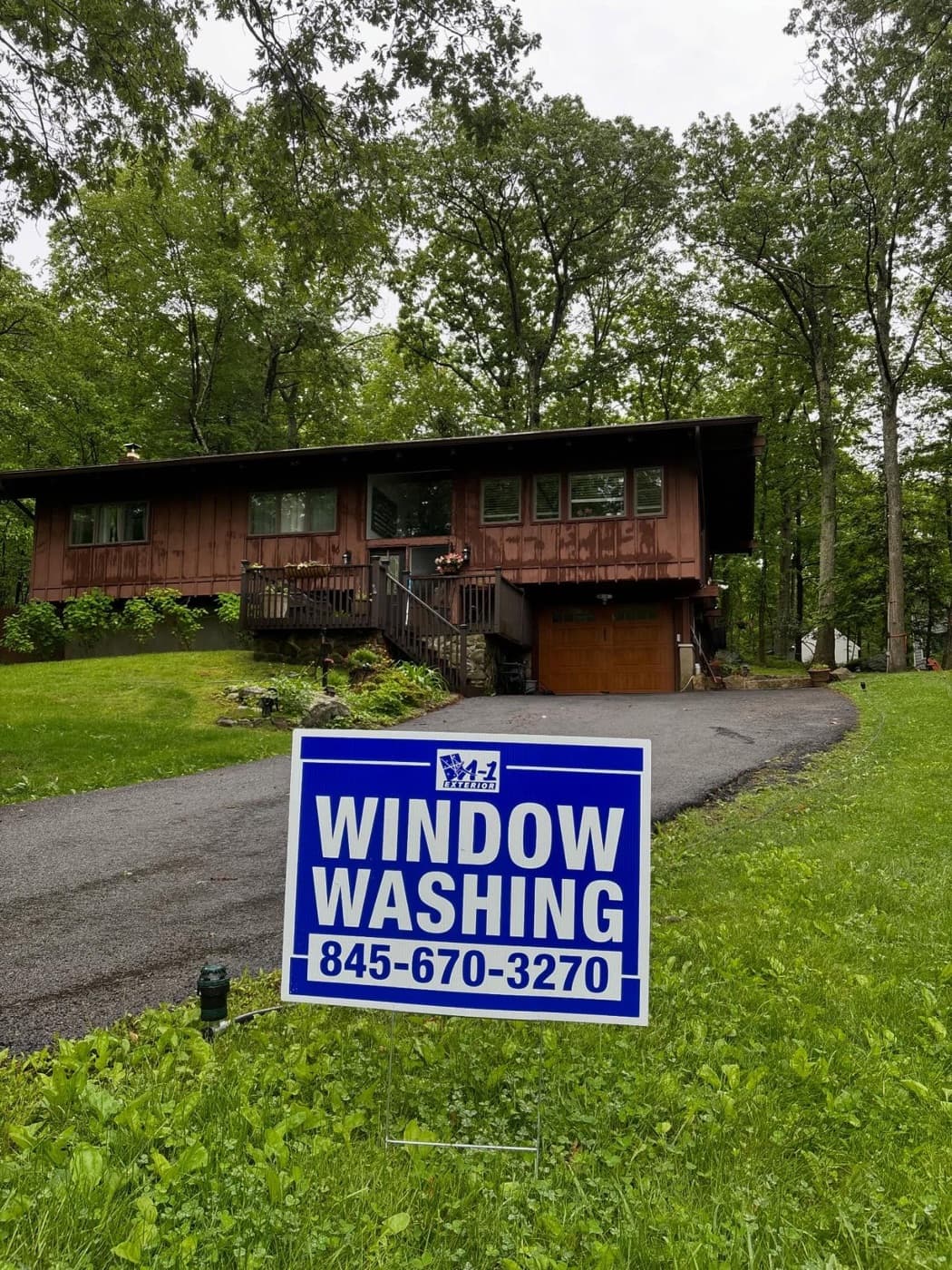 A-1 Exterior window-washing yard sign on a finished job